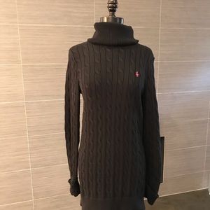 Black turtle neck, tunic sweater.